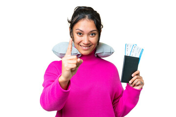 Wall Mural - Young Uruguayan woman holding a passport over isolated chroma key background showing and lifting a finger