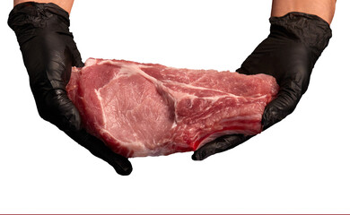 Chef showing a piece of fresh pork meat (pork steak). Chef's hands in black gloves close-up on transparent background