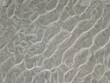 Sand des Wattenmeeres mit Wellenmuster