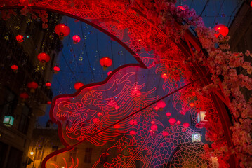 Kamergersky lane decorated with Chinese red lanterns and an arch at night. celebrating Chinese New Year in Moscow.