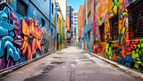 Fototapeta Uliczki - Narrow street in the city, full of colorful painted murals and graffiti