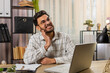 © Andrii Iemelianenko - Indian businessman freelancer working on laptop and feeling toothache touching mouth with hand, painful expression because of dental illness. Caries, pulpitis, gum disease, dental disease concepts.