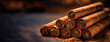 Rolled tobacco leaves are aligned neatly. Close-up of cigars with detailed textures, resting atop a wooden surface.