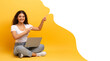 © Prostock-studio - Indian woman with laptop sits pointing to speech bubble, collage
