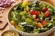 Healthy fresh salad with vegetables, greens in bowl. Homemade delicious lunch salad with cherry tomatoes, spinach, arugula for restaurant, menu, advert or package, close up selective focus