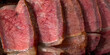 Beef Meat Grilled Steak sliced on wooden board. Homemade cooking beef steak for restaurant, menu, advert or package, close up, selective focus