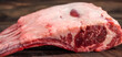 Beef steak raw meat close up on wooden board. Cooking beef steak slice for restaurant, menu, advert for package, selective focus