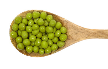 Wall Mural - Boiled green peas in wooden spoon isolated on white, top view