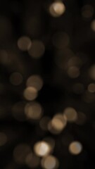 Wall Mural - vertical video - abstract bokeh background animation with fast flickering defocused warm golden boke