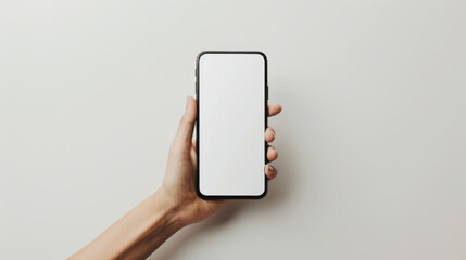 Canvas Print - A hand is holding a smartphone with a blank screen against a white background, offering a clear view for placing a digital interface or mobile app demonstration.