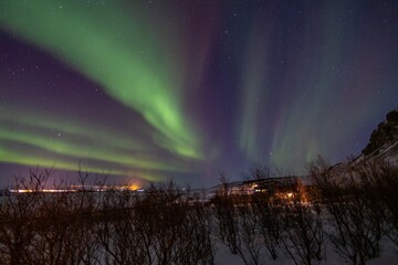 scenic view of aurora borealis over iceland