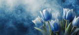 Fototapeta Tulipany - Tulipany niebieskie kwiaty w dymie,  abstrakcyjne niebieskie tło kwiatowe. Puste miejsce