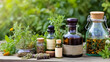 Herbal medicine displayed outdoors with tincture bottles healing herbs and wooden box of herbs Copy space image Place for adding text or design