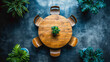 © ImageFlow - Aerial view of a round wooden table surrounded by plants in a dark office space. Generative AI