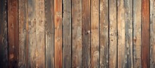 A Detailed Shot Of A Brown Wooden Fence Showcasing The Intricate Patterns Of The Hardwood Planks, Enhanced By The Glossy Varnish Finish