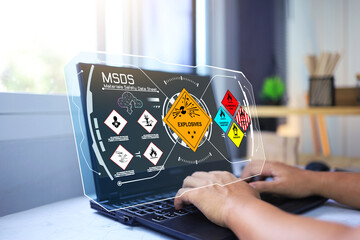 Wall Mural - material safety data sheet msds with staff on laptop computer to down load dangerous chemical inform