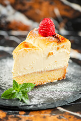 Wall Mural - Delicious soft-baked creamy Patterson cheesecake with a spongecake base.