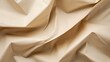 © Irina Ukrainets - Elegant beige fabric texture with gentle folds. perfect for backgrounds and design projects. soft and luxurious material visual. AI