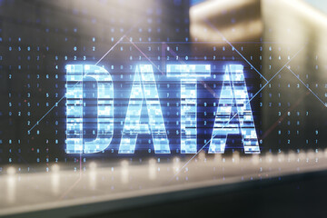 Wall Mural - data word hologram on contemporary business center exterior background, big data and blockchain conc
