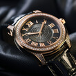 men's gold watch on black fabric,  jewelry, close-up