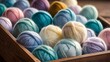 Closeup image of colorful wool yarn balls in box. Multi-colored threads for knitting	
