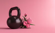 © Femmes.Digital - Creative design with a black kettlebell and flowers on pink background. Happy women's Day. 8 march. Copy space.