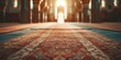 mosque interior illuminating by warm sunlight filtering through ornate windows on rug floor. Decorated carpet of a mosque with sunset light