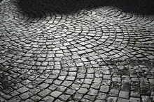 Cobblestones In A Street Against The Light