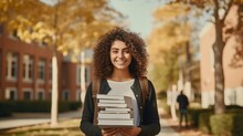 Happy Girl Student. Portrait Of Female Student With Books