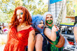 © GALDRIC - Cheerful group of drag queens in elegant outfit at pride party