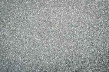 Wall Mural - Gray sand background. Textured sand surface.