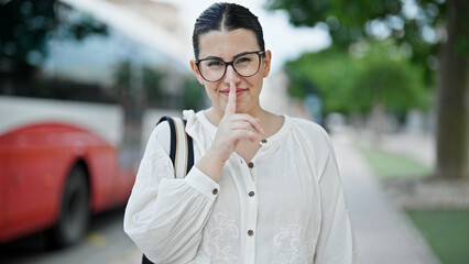 Sticker - Young beautiful hispanic woman woman smiling asking for silence at street