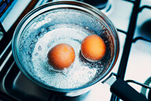 Boiled Eggs Are Cooked In A Saucepan On A Gas Stove For Breakfast