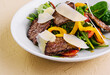 beef salad with basil, arugula and pepper