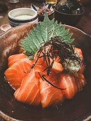 Wall Mural - Japanese rice with fresh salmon slice sashimi. Take a photo by smartphone