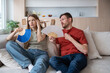 © DimaBerlin - Overheating irritated woman feel headache with upset frustrated husband fanning waving in apartment with broken air conditioner. Scorching day with discomfort grappling with high temperatures at home