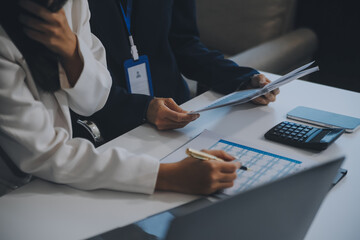 Co working conference, Business team meeting present, investor colleagues discussing new plan financial graph data on office table with laptop and digital tablet, Finance, accounting, investment.