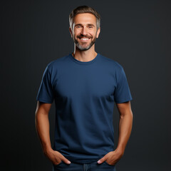 Wall Mural - Smiling men wearing blue T-Shirt Mockup on black studio background