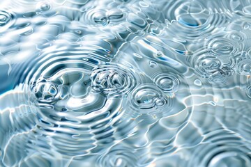 Poster - close-up of a water surface with ripples forming concentric patterns. The ripples are caused by a disturbance in the water, creating a dynamic and textured scene