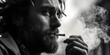 A man with a beard smoking a cigarette, suitable for lifestyle and addiction concepts