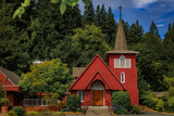 Fototapeta Na drzwi - Red facade of Saint Philip the Apostle Catholic Church in Occidental, California