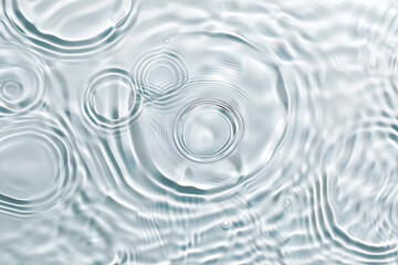 Leinwandbilder - water surface, revealing distinct circles formed by droplets or disturbances. The circles create an intriguing pattern on the otherwise calm water