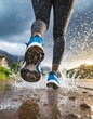 Young woman running in rainy weather, water and mud splashes as her feet hits the ground, low angle closeup detail from behind, only legs with shoes visible
