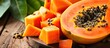 A photo of freshly cut papaya pieces arranged neatly on a wooden cutting board, ready to be enjoyed.