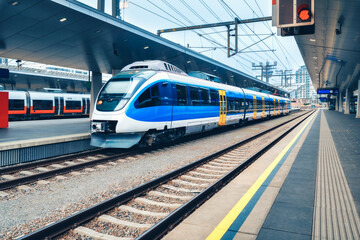Wall Mural - high speed train at the railway station in vienna, austria. beautiful blue modern intercity passenge