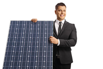 Wall Mural - Manager behind a solar panel smiling and looking at camera