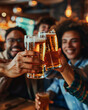 Group of happy friends drinking and toasting beer at brewery bar restaurant. Friendship concept with young people having fun together at cool pub.