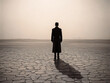 Photo of a lonely man walking in a deserted place, minimalism. Generative ai