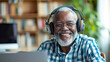 Portrait photo of senior man working with headphones on