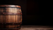 vintage wooden barrel on a dark background, copy space